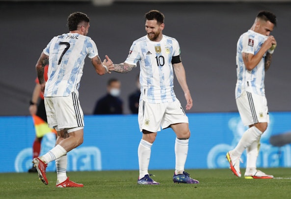 Rodrigo De Paul och Lionel Messi